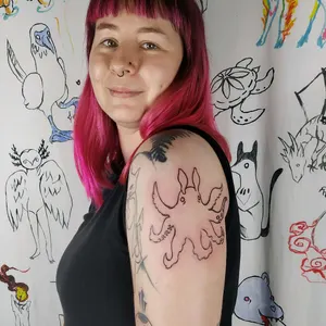 newly inked, dumbo octopus arm tattoo
