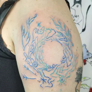 line tattoo, water and creatures swimming