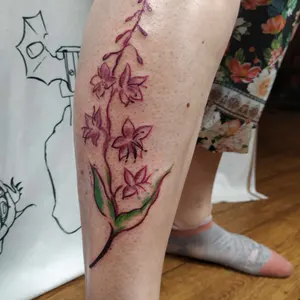Colorful tattoo fireflower